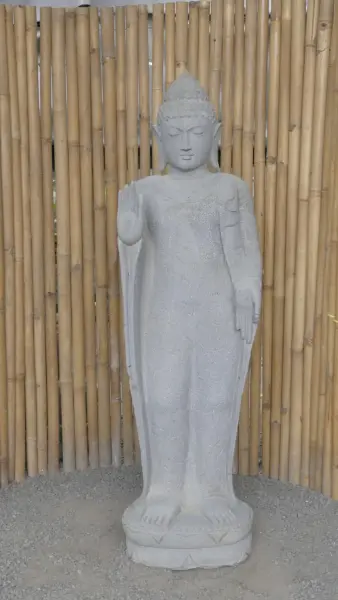 Product image of the product “Standing Buddha with floral carving, Abudaya position. 48 x 34,5 x 151,5 cm. Natural stone (river stone), stonemasonry ”